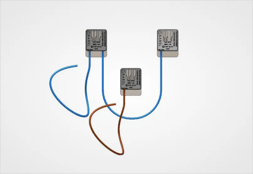 An illustration of three electrical terminal blocks, each with wires inserted, two blue and one brown.